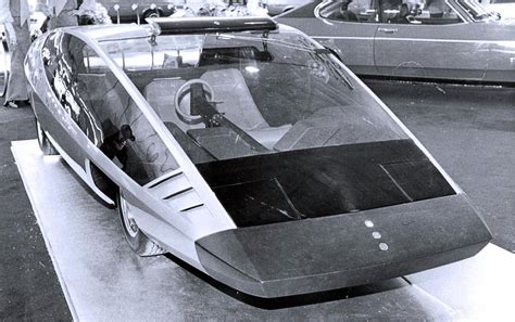 Ford Ghia Coins automobilio interjero schema su centrine sėdyne