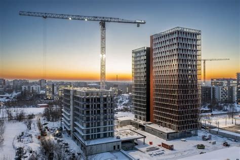 Teminė nuotrauka, vaizduojanti statybų aikštelę arba verslo pastatus