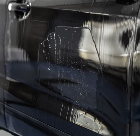 apsauginė danga automobiliui juodos spalvos