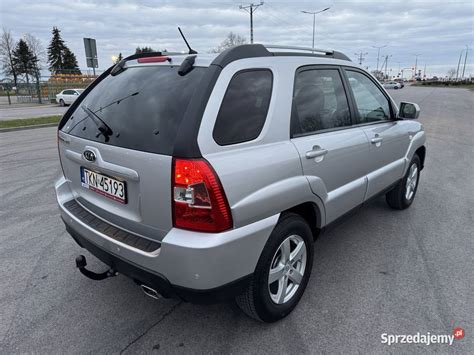 Kia Sportage II automobilio bendras vaizdas, priekinė ir šoninė perspektyva