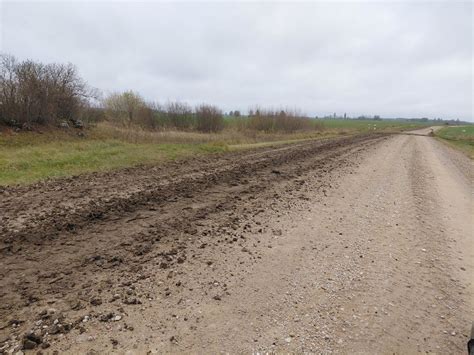 Tematinė nuotrauka: kelininkų brigados ir barstytuvai dirba ant slidžios kelio dangos