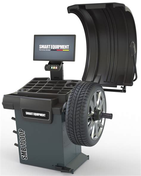 Automobilio ratai ant balansavimo staklių