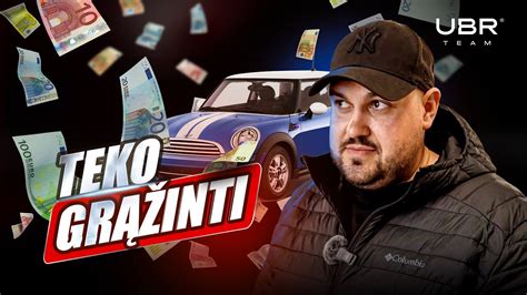 Teminė nuotrauka: žmogus, parduodantis automobilį supirkėjui, kuris sumoka pinigus ir tvarko dokumentus