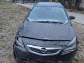 Nuotrauka su suremontuotu Opel automobiliu po autoįvykio