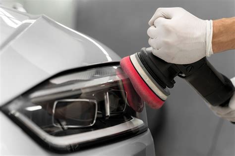 Photo demonstrating car headlight polishing process