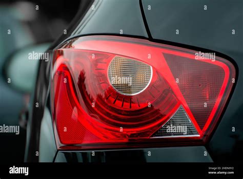 Themantic photo of a car with rear lights on