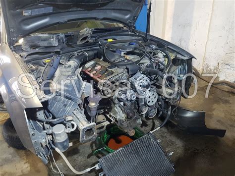 Vandens siurblio ir termostato montavimas Audi A6 C4