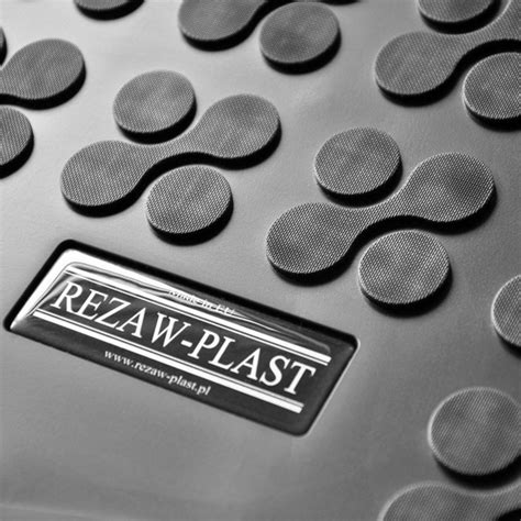 logotipo REZAW-PLAST ir pavyzdinė gamykla