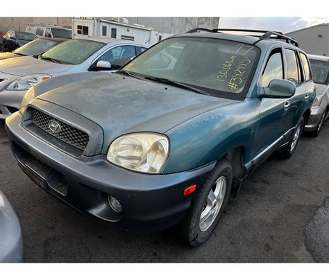 interjeras Hyundai Santa Fe 2003, odinės sėdynės