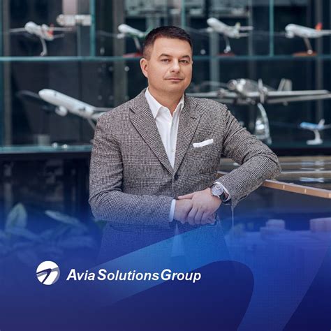 Nuotrauka, vaizduojanti „Avia Solutions Group“ biurą ar lėktuvą su logotipu.