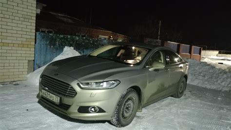 Tematinė nuotrauka su Ford Mondeo, galbūt važiuojančiu kelyje