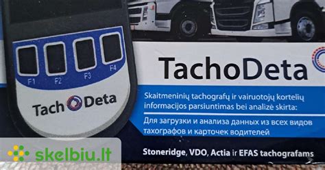 Tematinė iliustracija su sunkvežimiu ir tachografo simboliu