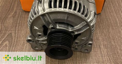 Automobilio generatorius ir starteris su matomomis vario detalėmis