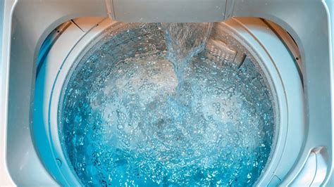 Thematic photo of a washing machine with a water tank in a country house
