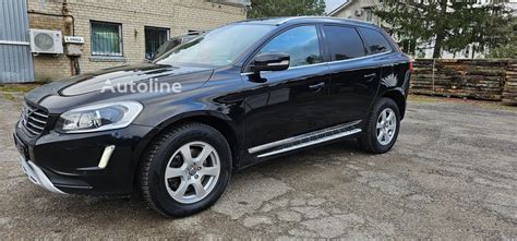 Volvo specialiosios paskirties automobilio (pvz., XC60) nuotrauka su atitinkama simbolika