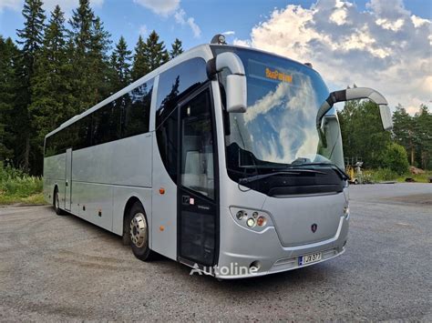 Teminis turistinio autobuso, vežančio keleivius, nuotrauka