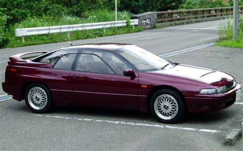 Subaru SVX su BBS ratlankiais ir spoileriu