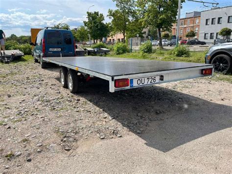 Įvairių tipų priekabos, skirtos krovinių pervežimui
