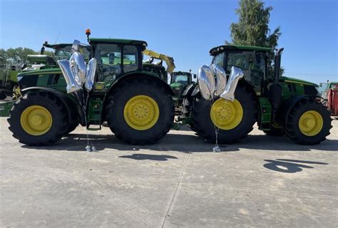 Nuotrauka, vaizduojanti John Deere traktorių arba kitą žemės ūkio techniką