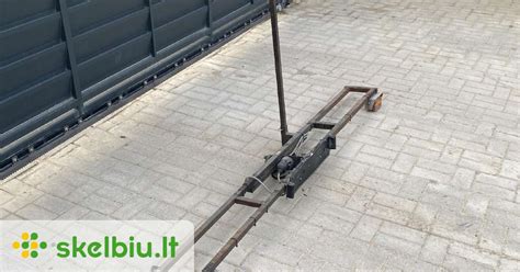 Motociklo laikiklis ant automobilio kablio