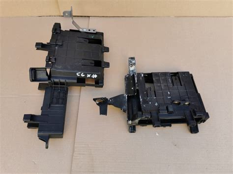 BMW E39 saugiklių dėžutės vieta daiktadėžėje