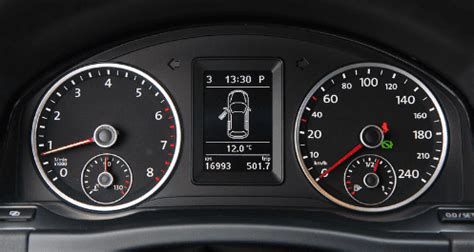 The dashboard of a VW Passat B5 with various indicator lights