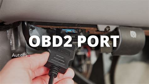 A diagnostic scan tool connected to a car's OBD-II port