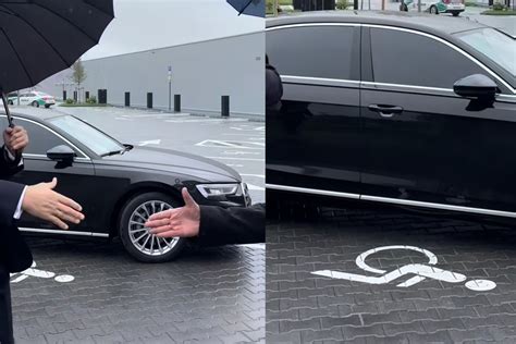 Teminė nuotrauka su išmaniuoju telefonu ir automobilio stovėjimo vieta