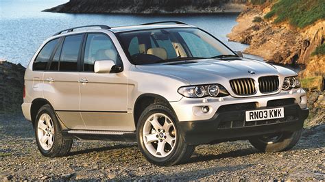 BMW X5 E53 interjeras su pirštinių skyriumi