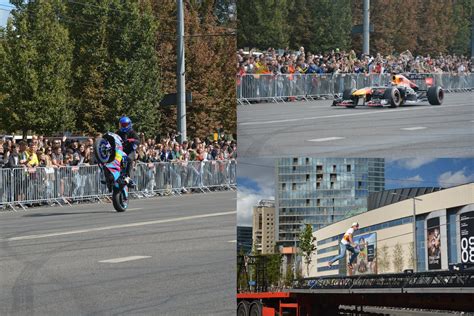 Tematinė nuotrauka: drifto bolidas, slystantis šonais miesto gatvėmis, apsuptas betoninių blokų