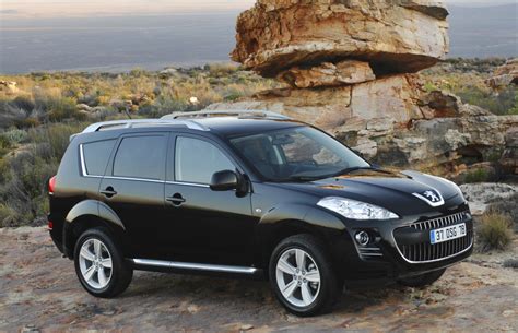 The Peugeot 4007 SUV exterior design showcasing its distinctive front grille and headlights