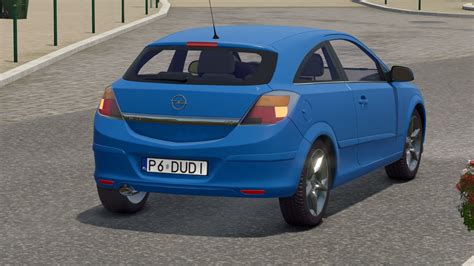 Nuotrauka, iliustruojanti Opel Astra H generatoriaus vietą variklio skyriuje