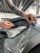 Profesionaliai užklijuota skaidri PPF plėvelė ant automobilio kėbulo