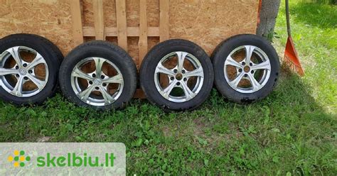 Išvardinti įvairių gamintojų naudoti R15 ratlankiai su skirtingais tvirtinimo taškais.