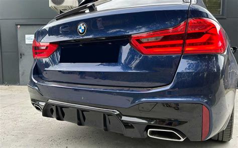 BMW E39 M stiliaus galinio bamperio detalės ir medžiagų pavyzdžiai