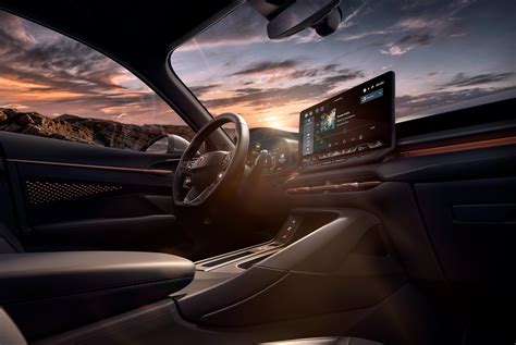 Vizualizacija: nuotrauka, vaizduojanti Opel Vectra C interjerą su išdėstytais mygtukais ir prietaisų skydeliu.