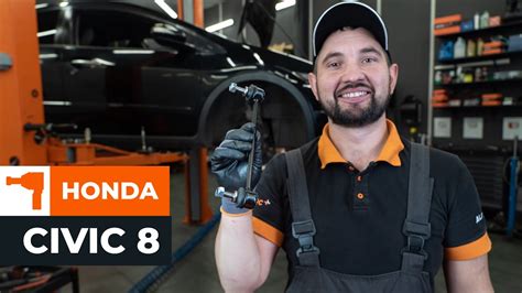 Schema, iliustruojanti priekinės stabilizatoriaus traukės montavimo vietą ir jos jungtis su kitomis pakabos detalėmis Honda CRV