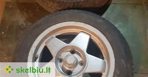 Audi 100 su R15 lietais ratlankiais