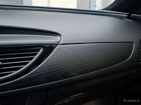 automobilio stogo apdailos klijavimo procesas