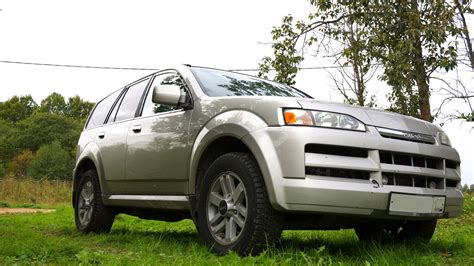 Techninė schema, rodanti Isuzu Axiom pakabos struktūrą ir padangų išdėstymą
