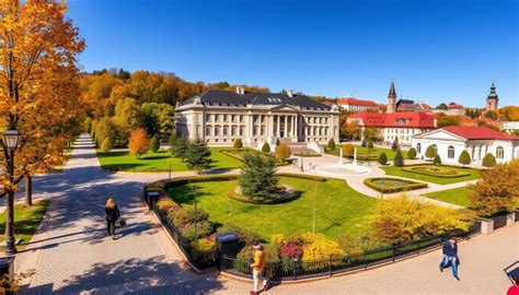 Tartu Rotušės aikštė su besibučiuojančių studentų fontanu