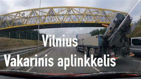 užtvindyto kelio atkarpa po liūties, vakarinis aplinkkelis