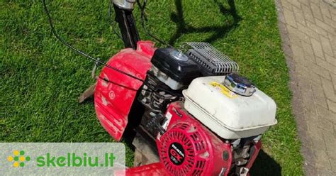 Teminė nuotrauka su Honda varikliu ir įrankiais