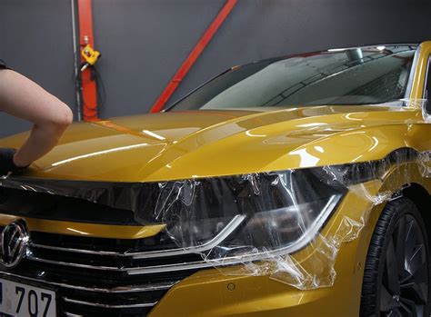 detalus automobilio priekinės dalies (kapoto, bamperio, žibintų) apklijavimas apsaugine PPF plėvele