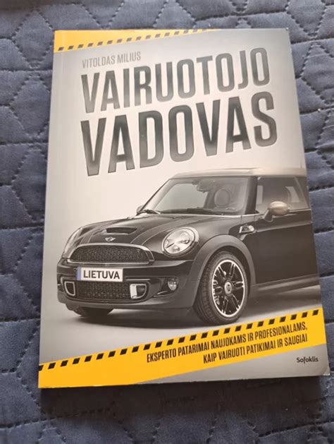 Knygos „Vairuotojo vadovas“ viršelis su automobilio atvaizdu