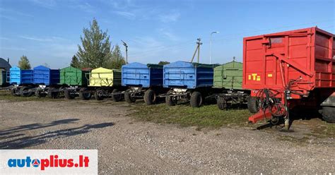 Teminis vilkiko su savivarte puspriekabe nuotrauka