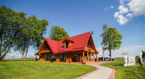 Nuotrauka su kelio ženklo „Kaimo turizmo sodyba“ pavyzdžiu