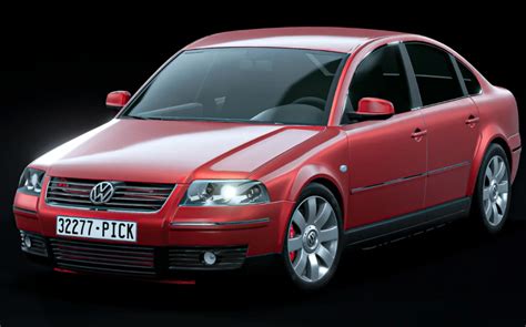 The front headlights of a Volkswagen Passat B5 shining brightly on a dark road.