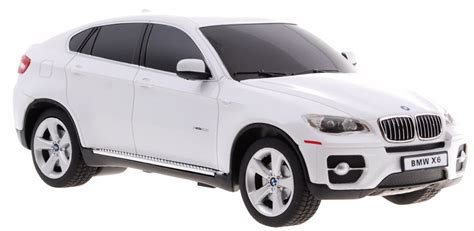 Vestuvių dekoracijomis papuoštas baltas BMW automobilis