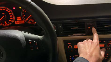 DTC mygtukas BMW automobilyje